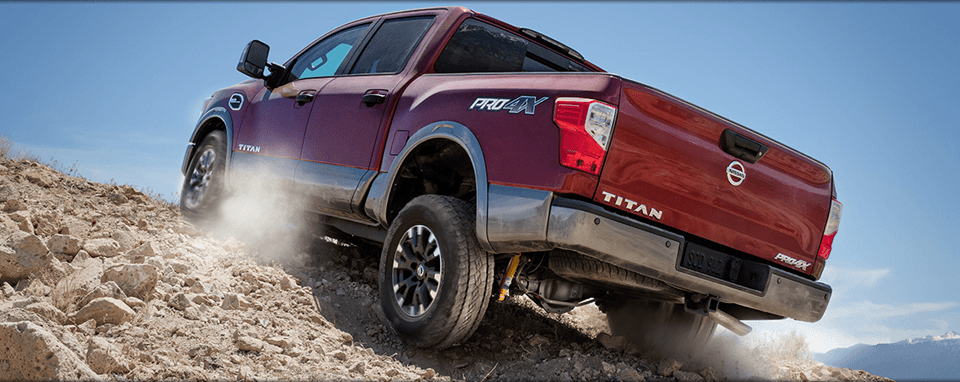 Red 2017 Nissan Titan with Silver Trim, Rear View